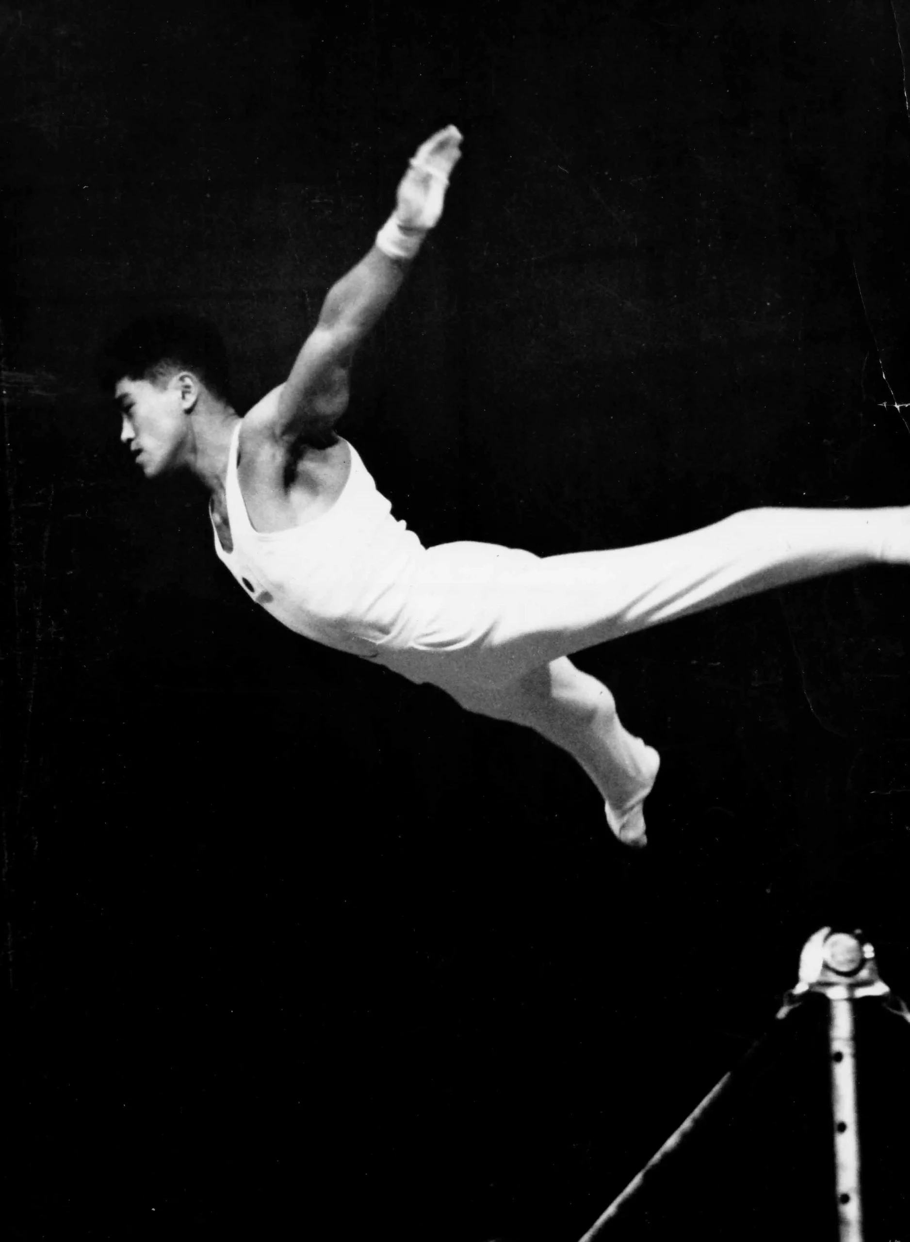 Endo dismounting the High Bar at the Rome Olympics in 1960